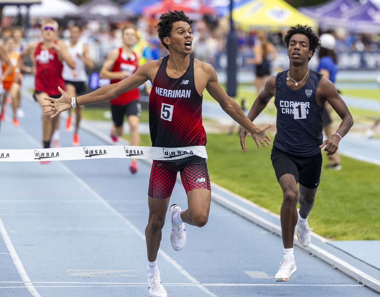 Herriman’s Tayshaun Ogomo crosses the finish line winning the 800m race and setting a state record during the 6A state track and field championship at the Clarence F. Robison Outdoor Track & Field at BYU in Provo on Saturday, May 17, 2025.