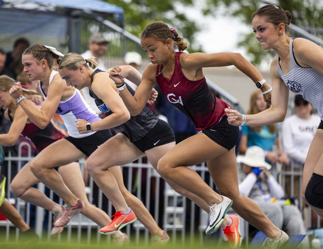 Cedar Valley’s Emerson Stout, second from right, comes out of the blocks during the 5A girls 100m dash, where she came in first place, during the 5A state track and field championship at the Clarence F. Robison Outdoor Track & Field at BYU in Provo on Saturday, May 17, 2025.