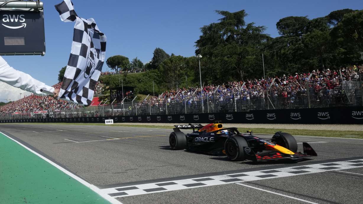 Red Bull driver Max Verstappen of the Netherlands crosses the finish line to win the Italian Emilia Romagna Formula One Grand Prix, at the Enzo and Dino Ferrari racetrack in Imola, Italy, Sunday, May 18, 2025.