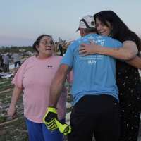Residents dig out from tornado damage after storms kill 27 in Kentucky, Missouri and Virginia