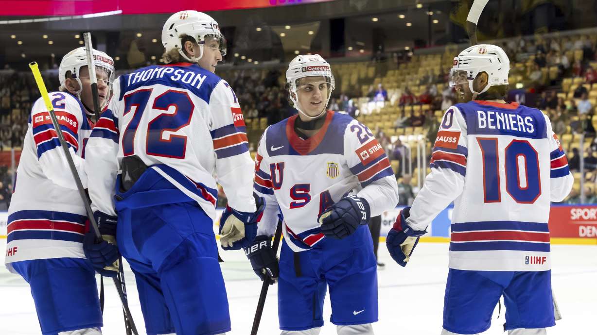 USA's Tage Thompson, 2nd left, celebrates his goal with teammates, Jackson Lacombe, left, Zeev Buium, 2nd right, and Matty Beniers, right, during the IIHF 2025 World Championship preliminary round group B game between Kazakhstan and USA, at the Jyske Bank Boxen, in Herning, Denmark, Sunday, May 18, 2025.
