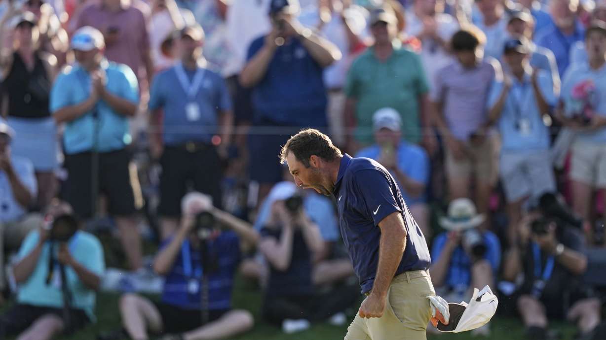 Scottie Scheffler celebrates after winning the PGA Championship golf tournament at the Quail Hollow Club, Sunday, May 18, 2025, in Charlotte, N.C.