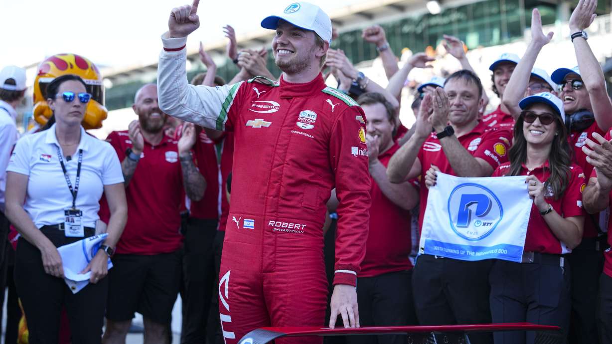 Robert Shwartzman, of Israel, celebrates after winning the pole position during qualifications for the Indianapolis 500 auto race at Indianapolis Motor Speedway in Indianapolis, Sunday, May 18, 2025.