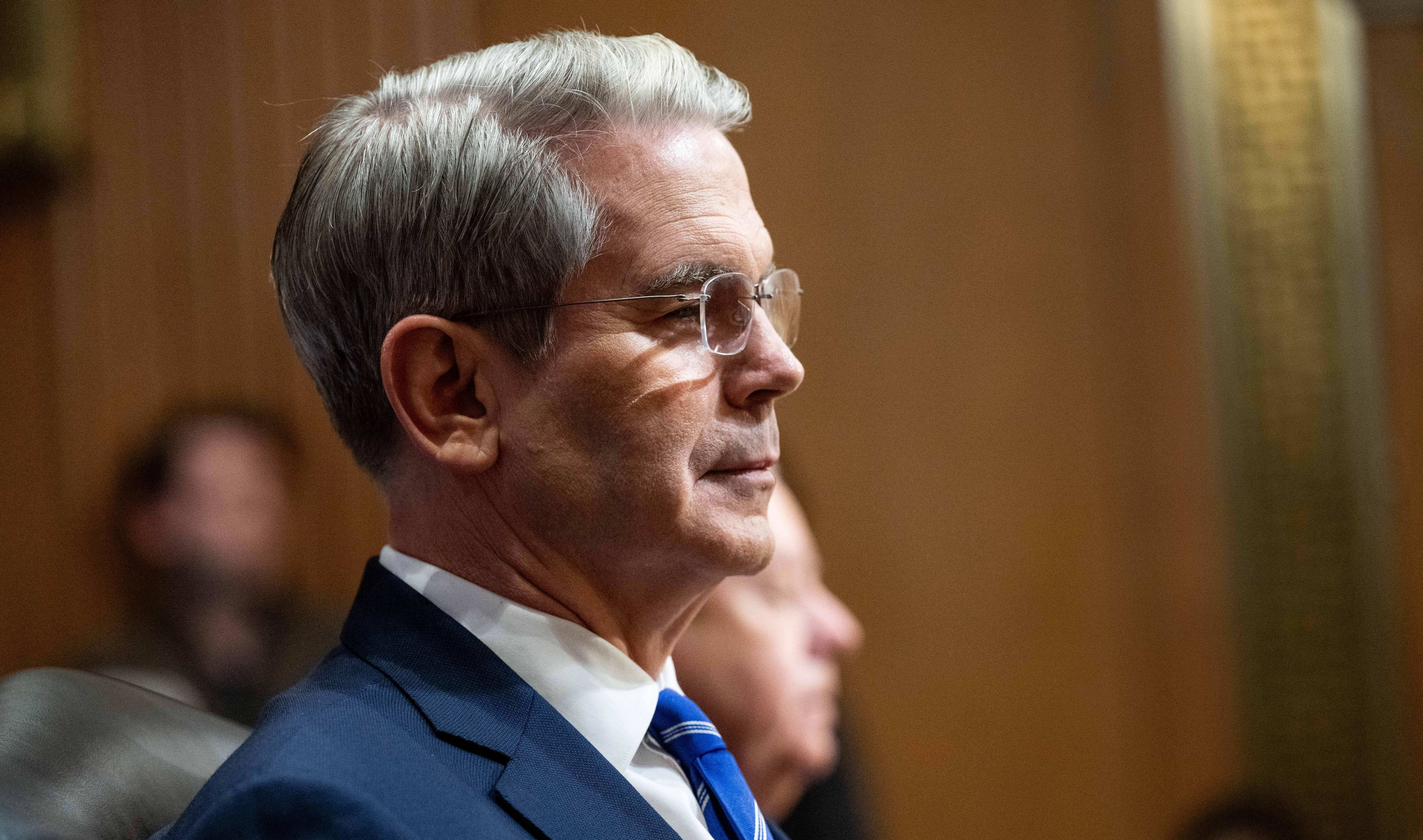 Scott Bessent attends a hearing on Jan. 16 at the Capitol in Washington. Bessent said Sunday a Republican spending bill would spur economic growth that would outpace what the nation owed.