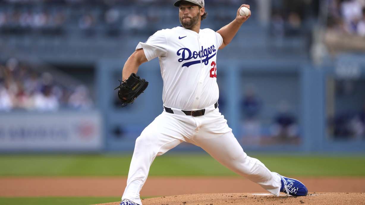 Los Angeles Dodgers starting pitcher Clayton Kershaw throws to the plate during the first inning of a baseball game against the Los Angeles Angels, Saturday, May 17, 2025, in Los Angeles.