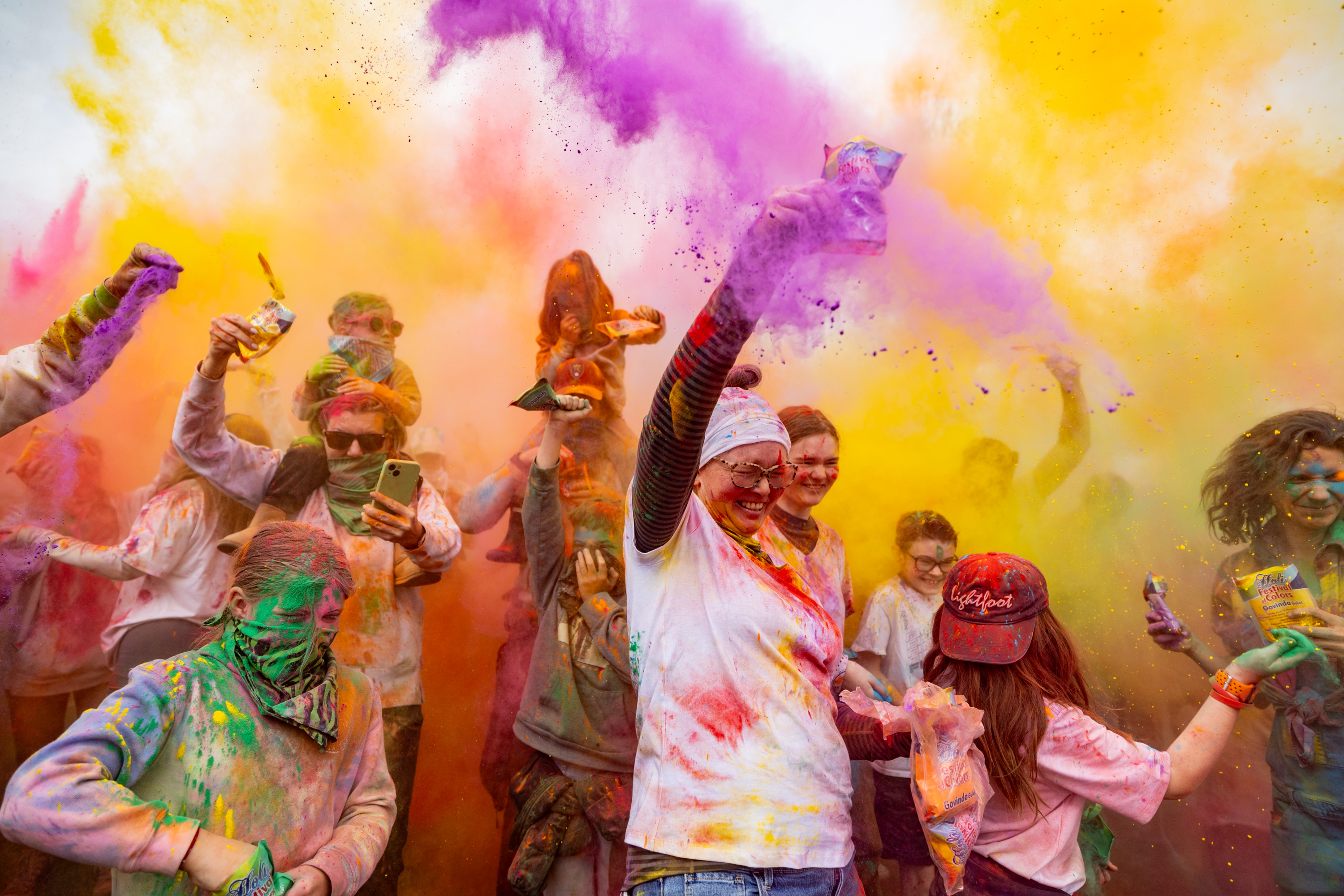 People participate in a color throw at the Holi Festival of Colors at Sri Sri Radha Krishna Temple in Spanish Fork on March 29.