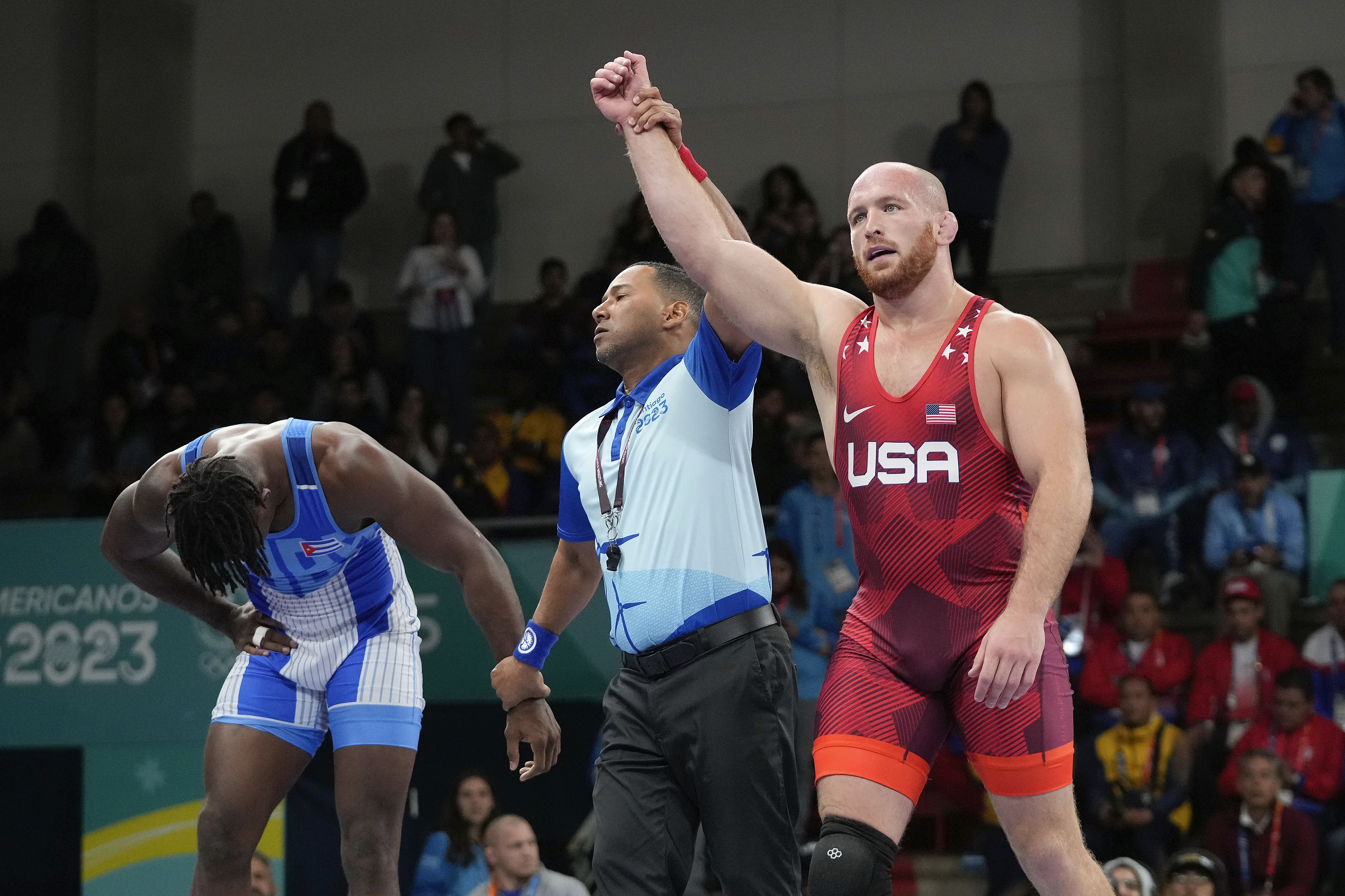 Wrestling gold medalist Kyle Snyder pleads to lesser charge after arrest in prostitution sting