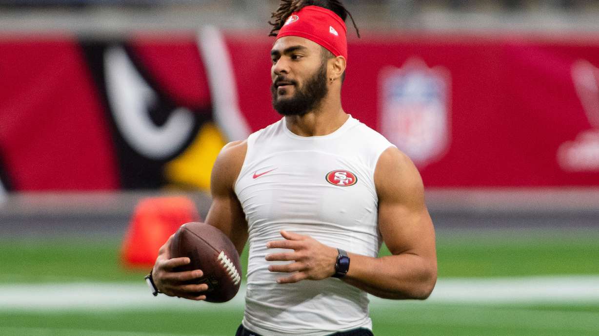 FILE - San Francisco 49ers middle linebacker Fred Warner (54) warms up prior to an NFL football game against the Arizona Cardinals, Dec. 26, 2020, in Glendale, Ariz.