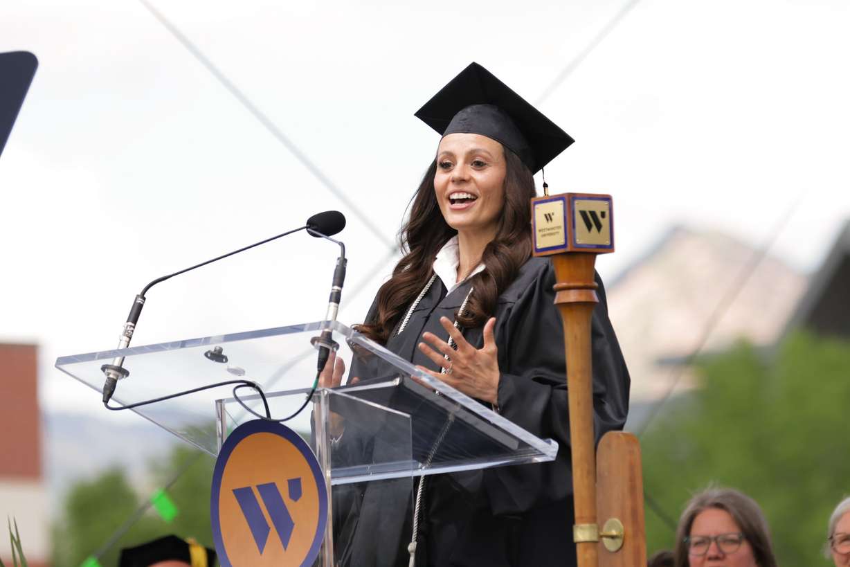 Student speaker Melissa Badger delivers an address during the graduate commencement ceremony at Westminster University on May 16.