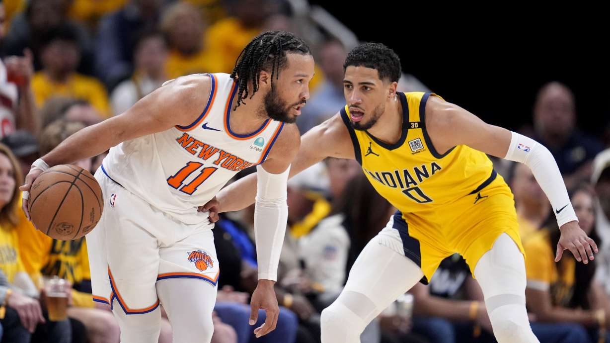 FILE - New York Knicks guard Jalen Brunson (11) drives past Indiana Pacers guard Tyrese Haliburton (0) during the second half of Game 3 in an NBA basketball second-round playoff series, Friday, May 10, 2024, in Indianapolis.