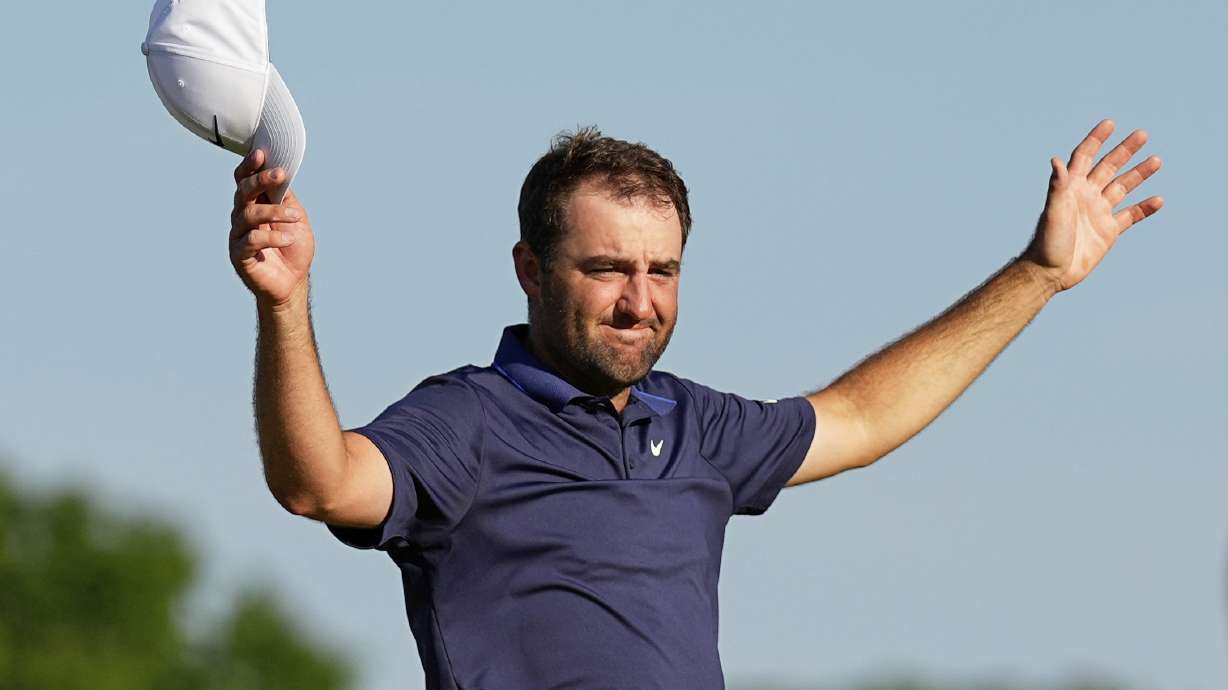 Scottie Scheffler celebrates after winning the PGA Championship golf tournament at the Quail Hollow Club, Sunday, May 18, 2025, in Charlotte, N.C.