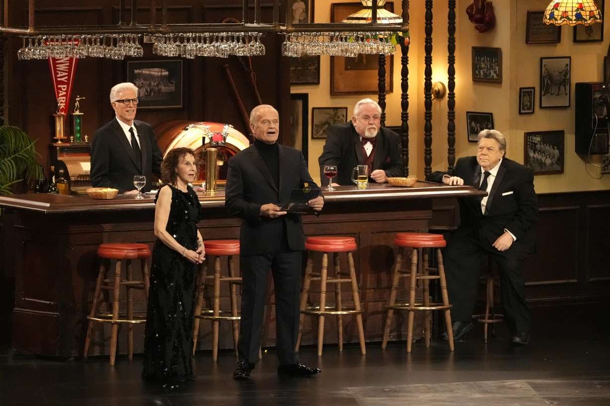 Rhea Perlman, from left, Kelsey Grammar, Ted Danson, John Ratzenberger, George Wendt present the award for outstanding writing for a comedy series during the 75th Primetime Emmy Awards on Jan. 15, 2024, at the Peacock Theater in Los Angeles.