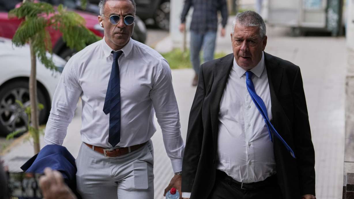 Physician Leopoldo Luque, left, arrives with lawyer Julio Rivas for a court hearing in the trial charging the medical team that treated late soccer star Diego Maradona with homicide by negligence in San Isidro on the outskirts of Buenos Aires, Argentina, Tuesday, March 11, 2025.