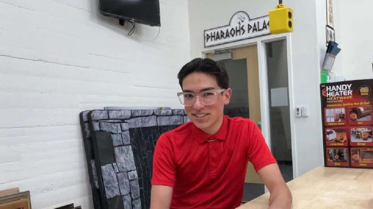 Tyson Duran, a ninth grader at Vista School, a public charter school focusing on arts, technology and academics, talks about building a large robot for his school's play.