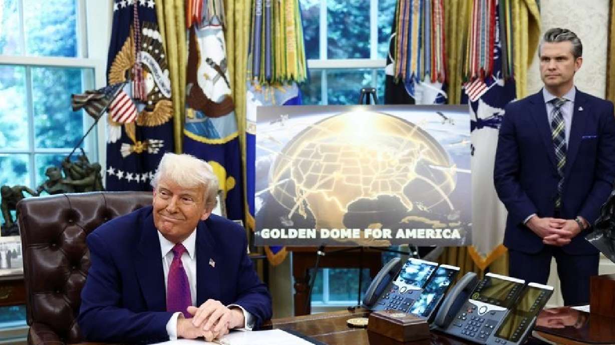 President Donald Trump makes an announcement regarding the Golden Dome missile defense shield next to U.S. Defense Secretary Pete Hegseth in the Oval Office of the White House in Washington, Tuesday.