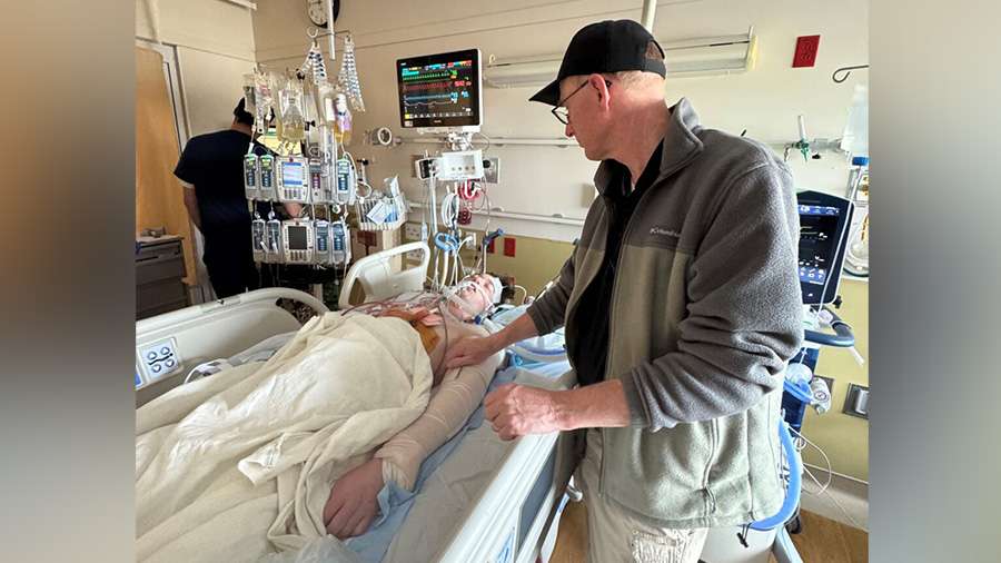 Jayden Rich was hit while riding his motorcycle in Bountiful last Friday. He is pictured recovering in the hospital, in a coma.