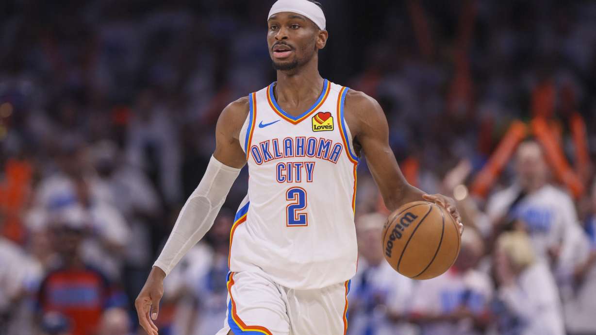 Oklahoma City Thunder guard Shai Gilgeous-Alexander dribbles the ball up court against Minnesota Timberwolves during the second half of Game 1 of an NBA basketball Western Conference Finals playoff series Tuesday, May 20, 2025, in Oklahoma City.