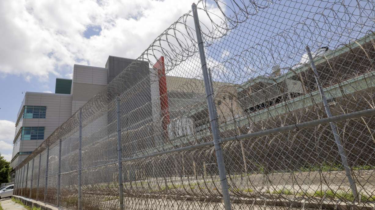 A worker charged with aiding the New Orleans jailbreak by 10 prisoners shut off water to unclog a toilet, not to allow the men to cut the pipe to create an opening for their escape, the employee's lawyer told the Associated Press on Wednesday.