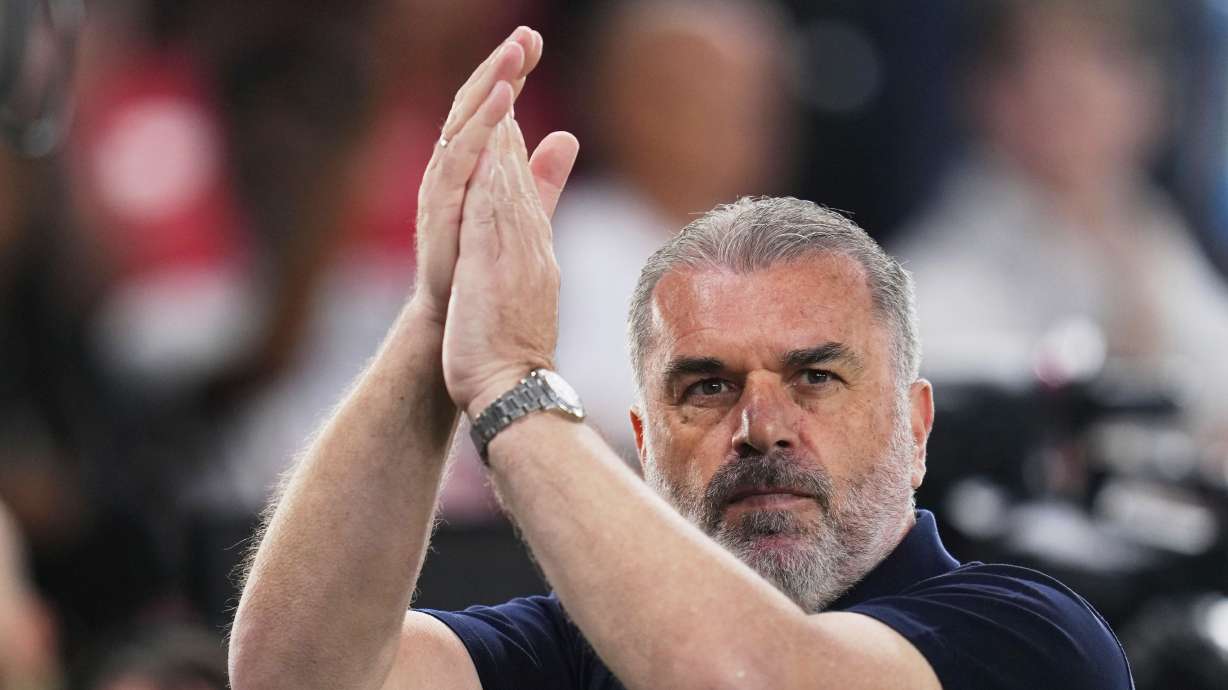 Tottenham's head coach Ange Postecoglou applauds ahead of the Europa League final soccer match between Tottenham Hotspur and Manchester United at the San Mames Stadium in Bilbao, Spain, Wednesday, May 21, 2025.