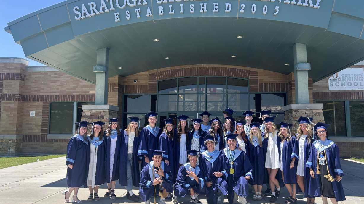 Graduates from Westlake High School gathered outside their former elementary school in Saratoga Springs on Wednesday.