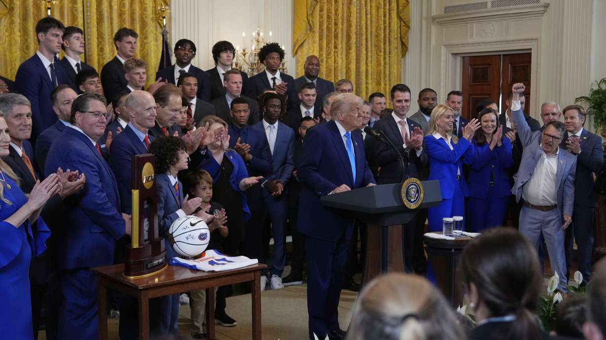 President Donald Trump speaks as he hosts the 2025 NCAA Champion, University of Florida men's basketball team in the East Room of the White House, Wednesday, May 21, 2025, in Washington.
