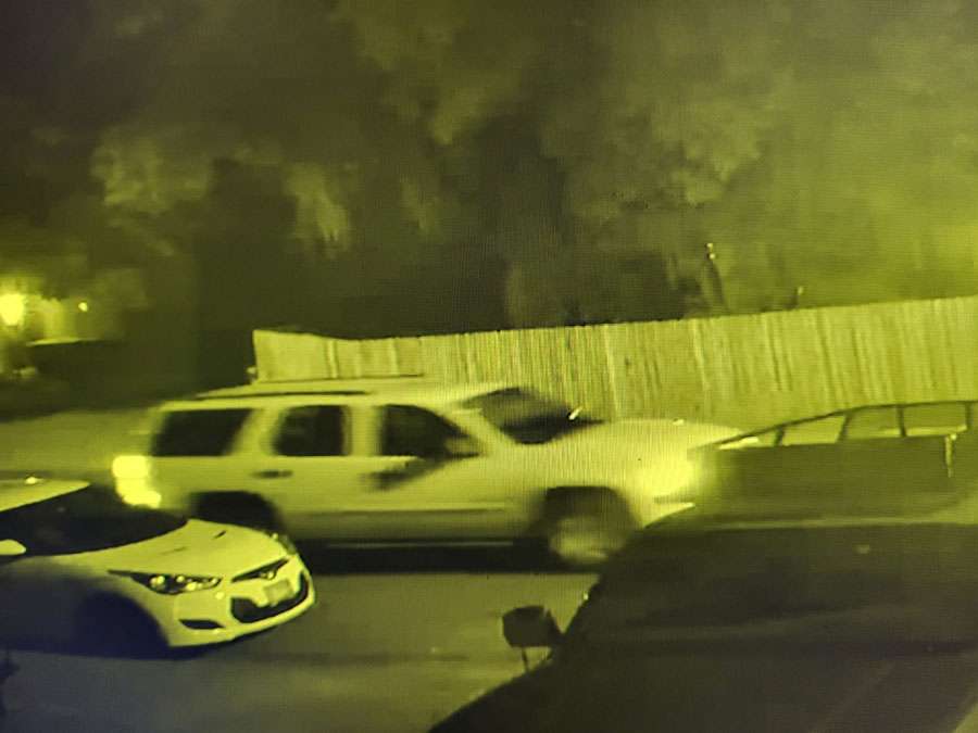 The white chevy Tahoe as seen on the security camera video.