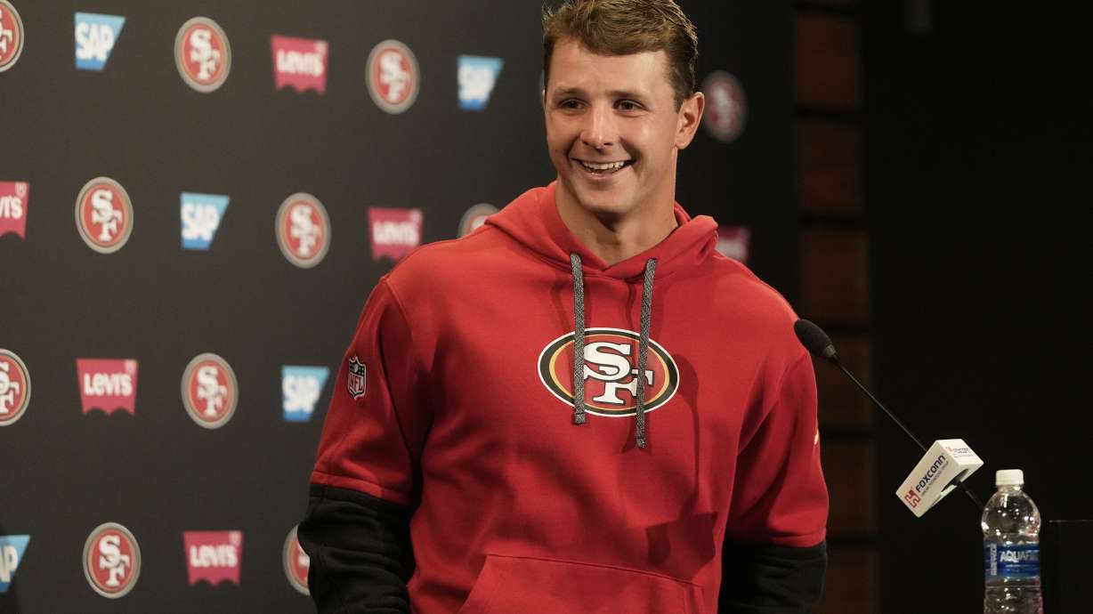 San Francisco 49ers quarterback Brock Purdy smiles after speaking during a news conference at the NFL football team's facility, Wednesday, May 21, 2025, in Santa Clara, Calif.