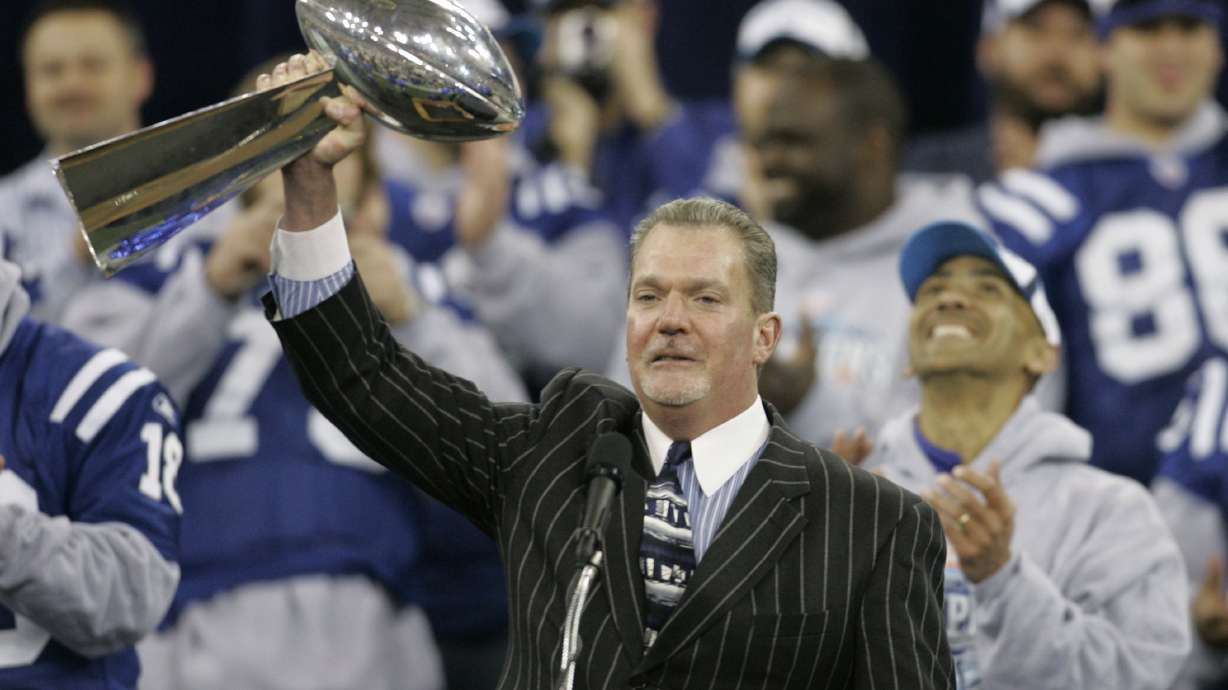 FILE - Indianapolis Colts owner Jim Irsay raises the Vince Lombardi trophy during a rally in Indianapolis, Monday, Feb. 5, 2007. The Colts defeated the Chicago Bears to win Super Bowl XLI.