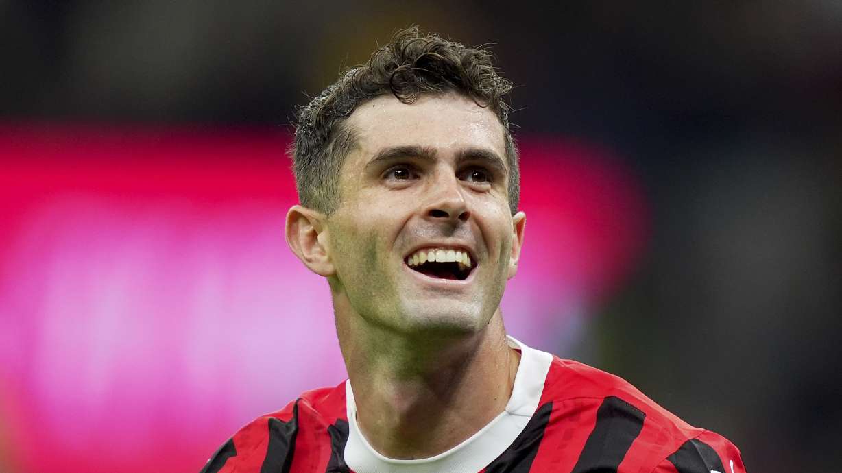 AC Milan's Christian Pulisic celebrates after scoring their second goal of the game during the Serie A soccer match between Milan and Bologna at San Siro Stadium in Milan, Italy, Friday May 9, 2025.