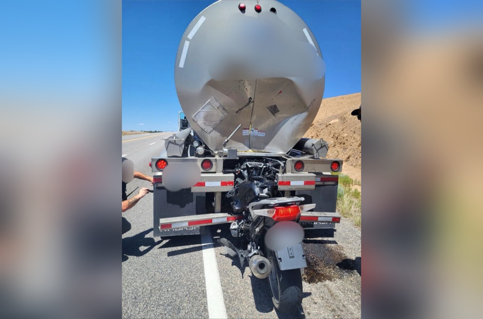 Wreckage of a motorcycle and semitrailer is seen after a fatal collision in Emery County on Wednesday.