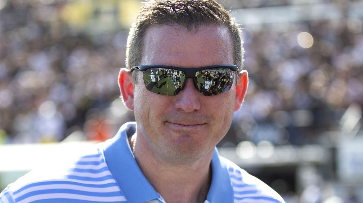 FILE - Then-Central Florida athletic director Danny White stands on the sideline at the team's NCAA college football game against Houston, Nov. 2, 2019, in Orlando, Fla.