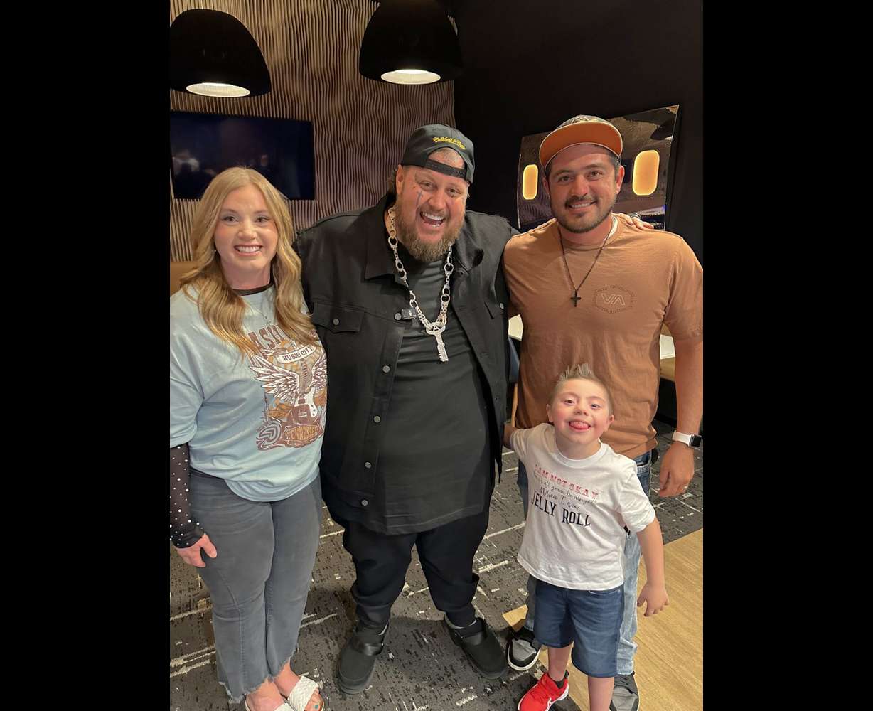 Brandon Barela and his parents meet with Jelly Roll backstage before his August 2024 show at the Delta Center.