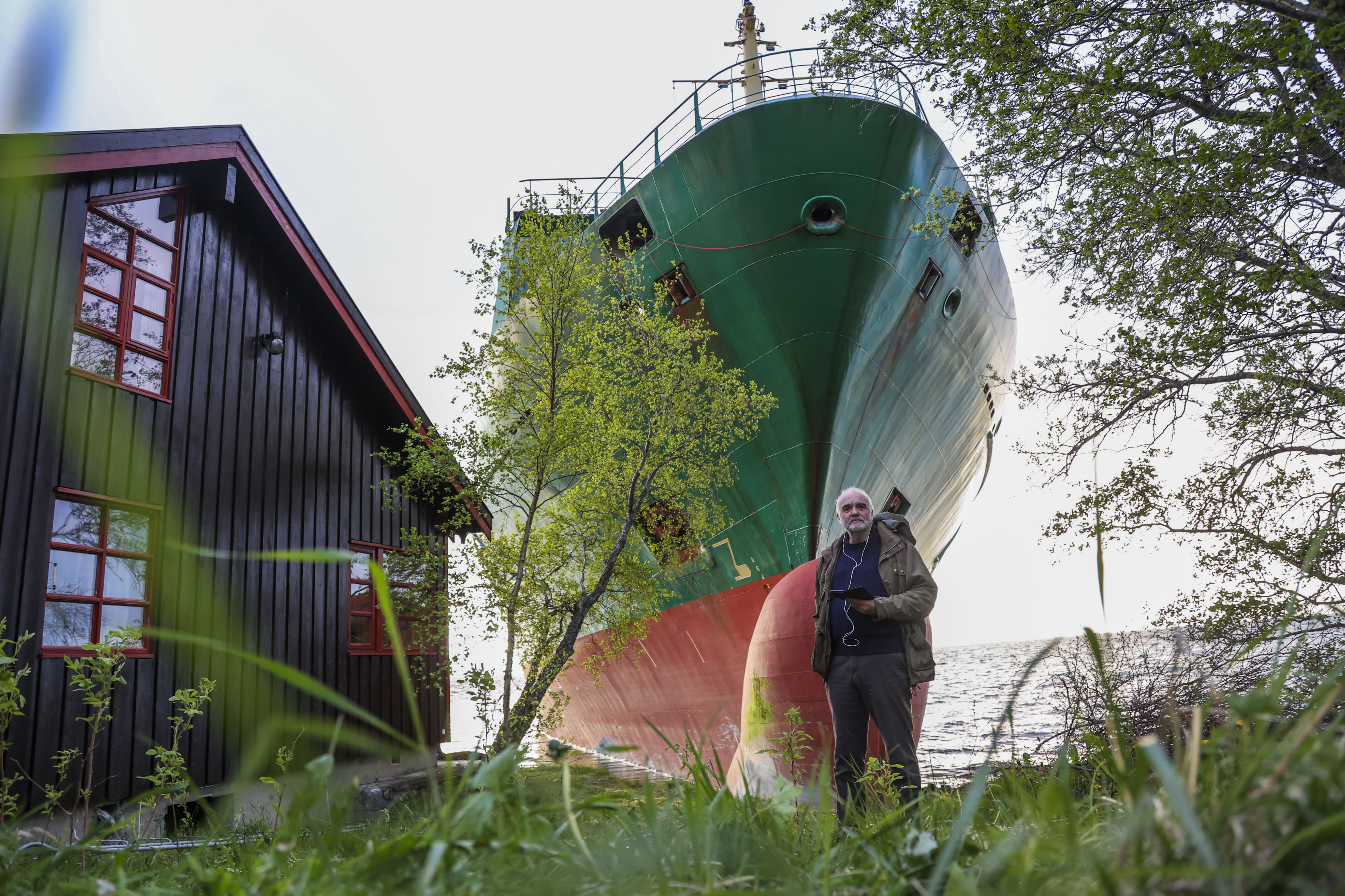 Man awakes to find grounded cargo ship narrowly missed his home 