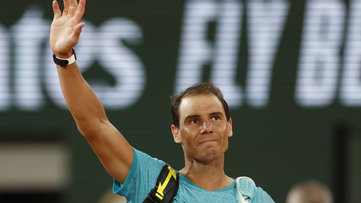 FILE - Spain's Rafael Nadal waves as he leaves the court after losing against Germany's Alexander Zverev during their first round match of the French Open tennis tournament at the Roland Garros stadium in Paris, May 27, 2024.