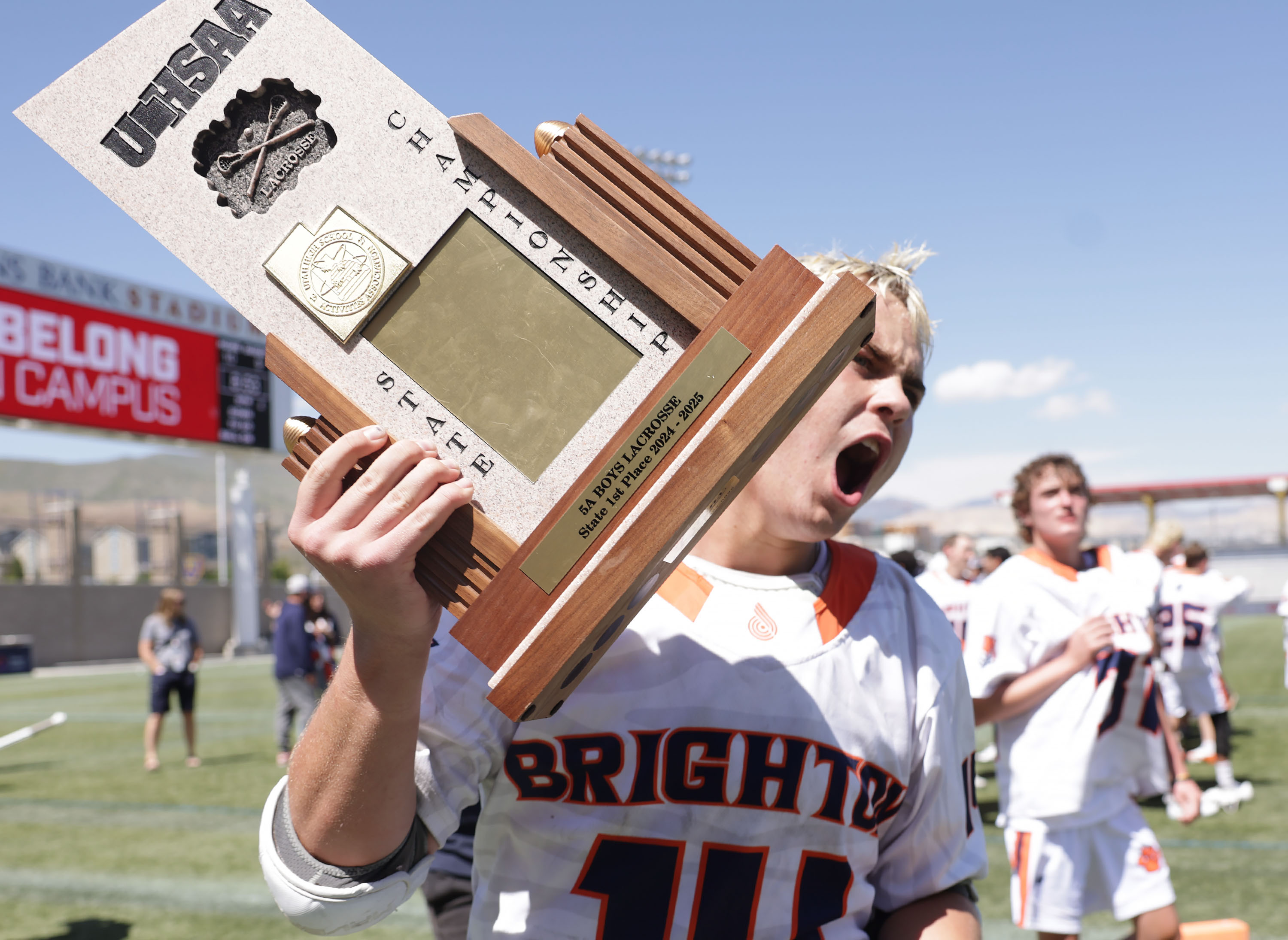 Brighton celebrates their 5A boys lacrosse state championship win against Park City at Zions Bank Stadium in Herriman on Friday, May 23, 2025. A six-goal fourth quarter launched Brighton over Park City for a 10-9 championship win and its second consecutive title.