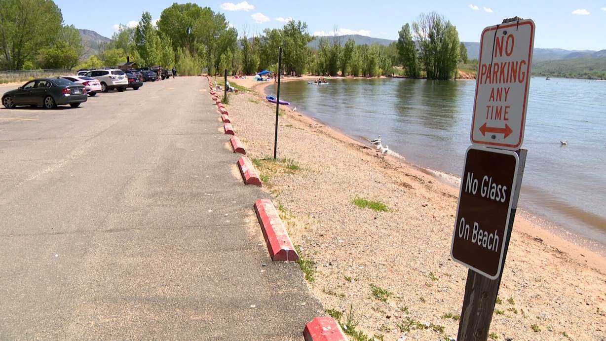 A "no parking" sign, leading into a beach area at Cemetery Point at Pineview Reservoir.