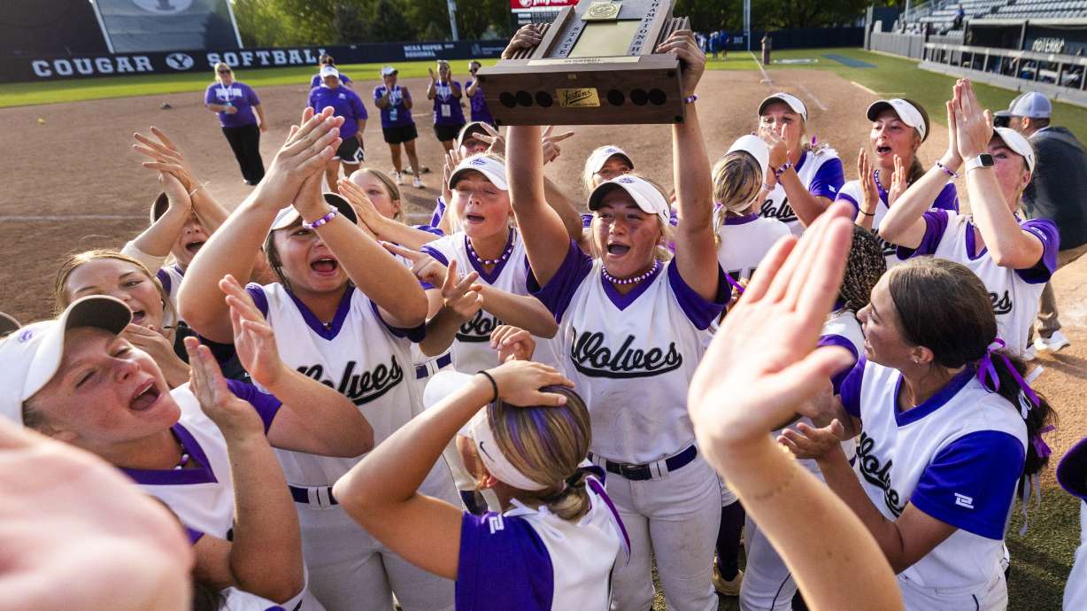 Riverton players celebrate their victory in the 6A softball state championship series between Riverton and Bingham at Miller Park Complex at BYU in Provo on Friday, May 23, 2025.