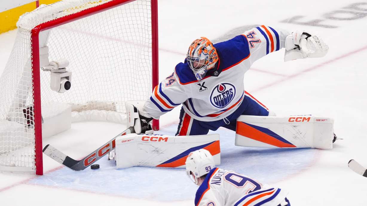 Edmonton Oilers goaltender Stuart Skinner makes a save against the Dallas Stars during the third period in Game 2 of the Western Conference finals in the NHL hockey Stanley Cup playoffs, Friday, May 23, 2025, in Dallas.