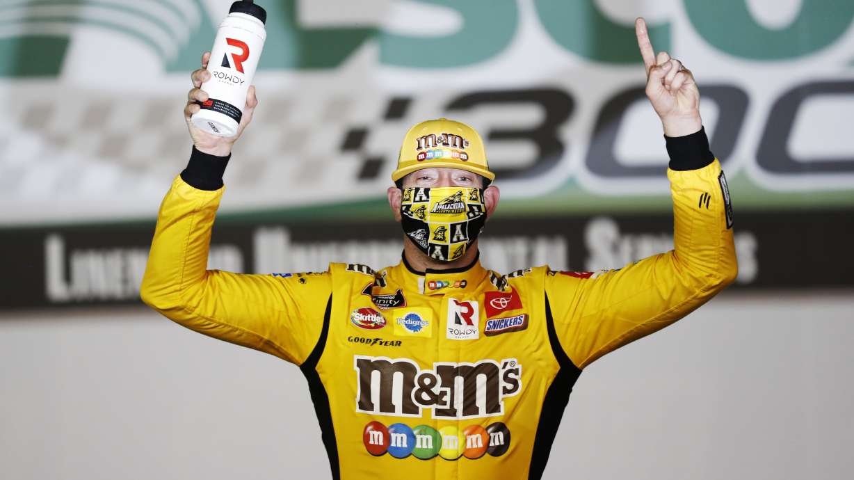 FILE - Kyle Busch (54) celebrates after winning the NASCAR Xfinity Series auto race at Charlotte Motor Speedway, May 25, 2020, in Concord, N.C.