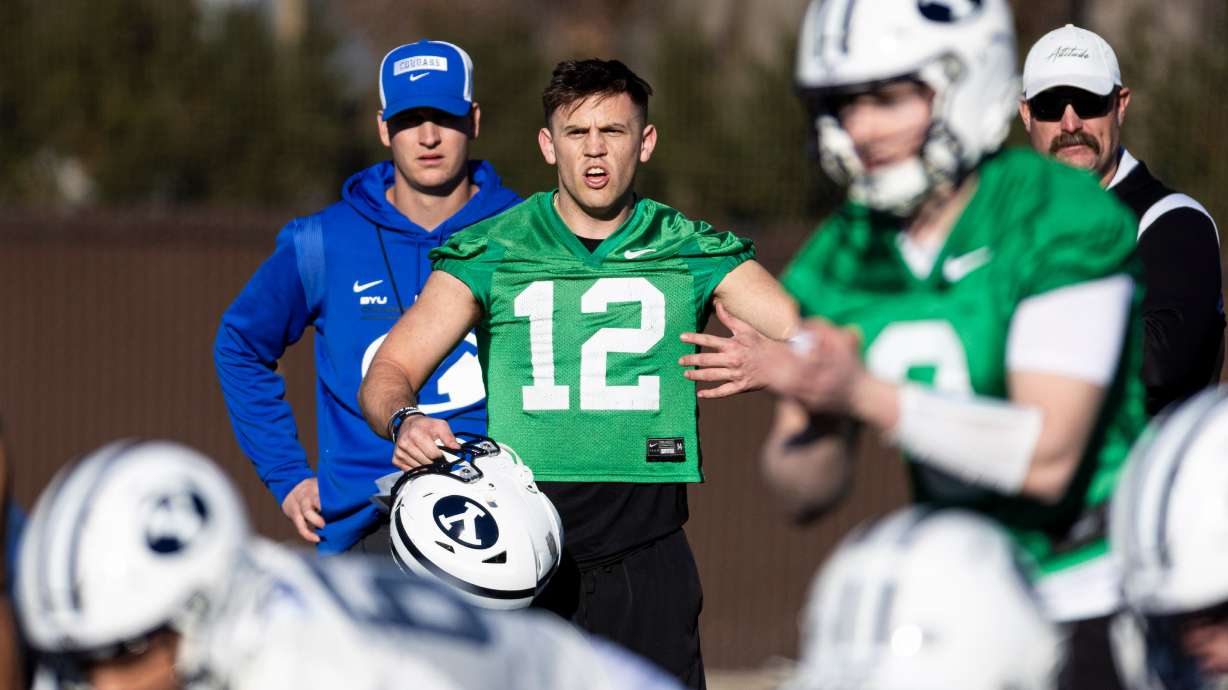 BYU quarterback Jake Retzlaff (12) at BYU football spring camp held at the Zions Bank Practice Fields of the Student Athlete Building on the campus of Brigham Young University in Provo on Feb. 27.