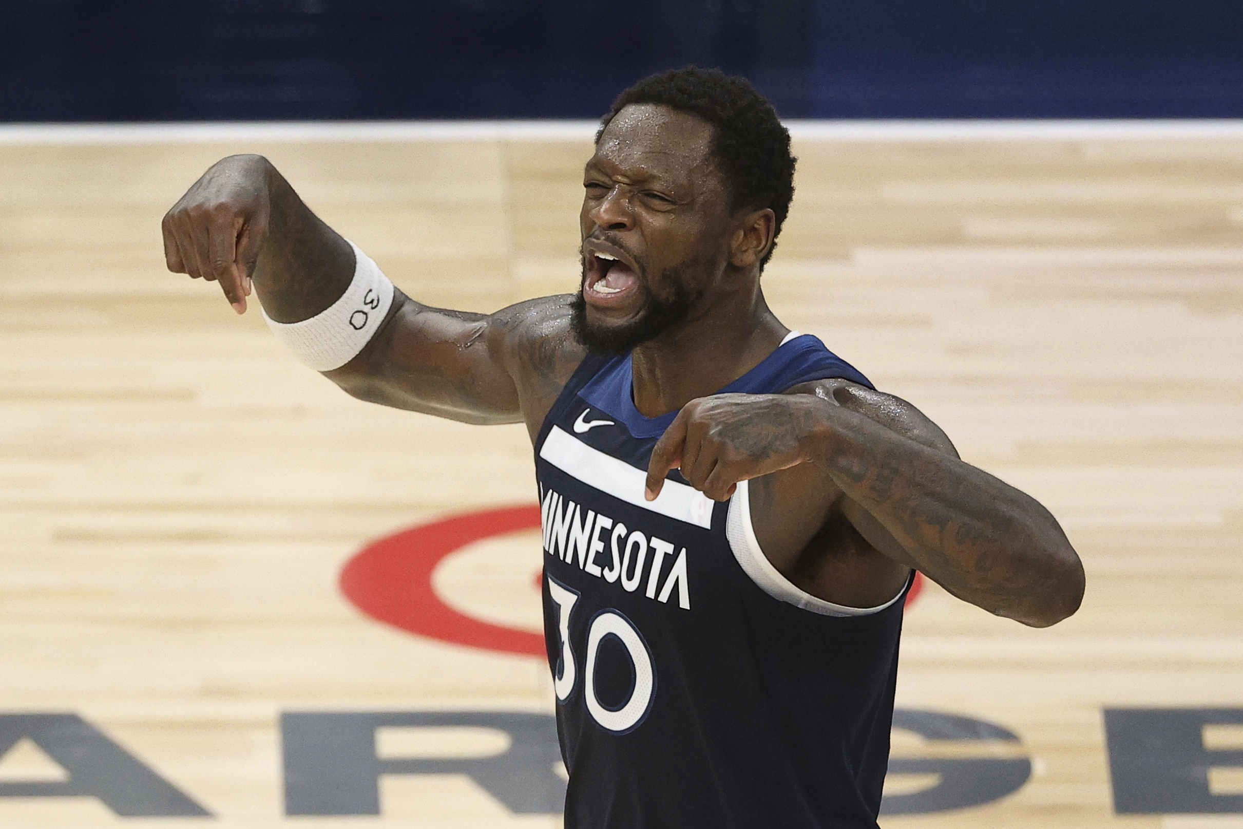 Minnesota Timberwolves forward Julius Randle (30) reacts during the second half of Game 3 of the Western Conference finals of the NBA basketball playoffs against the Oklahoma City Thunder, Saturday, May 24, 2025, in Minneapolis. 