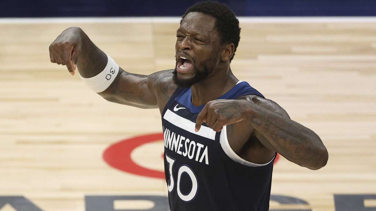 Minnesota Timberwolves forward Julius Randle (30) reacts during the second half of Game 3 of the Western Conference finals of the NBA basketball playoffs against the Oklahoma City Thunder, Saturday, May 24, 2025, in Minneapolis.