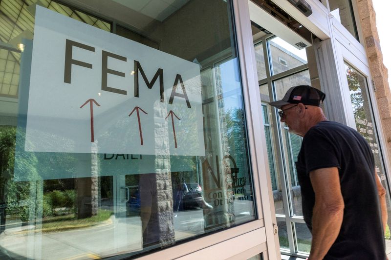 A resident enters a FEMA's station following the passing of Hurricane Helene, in Marion, N.C., Oct. 5, 2024. President Donald Trump's allies already wanted Cameron Hamilton out as the acting administrator of FEMA prior to congressional testimony.