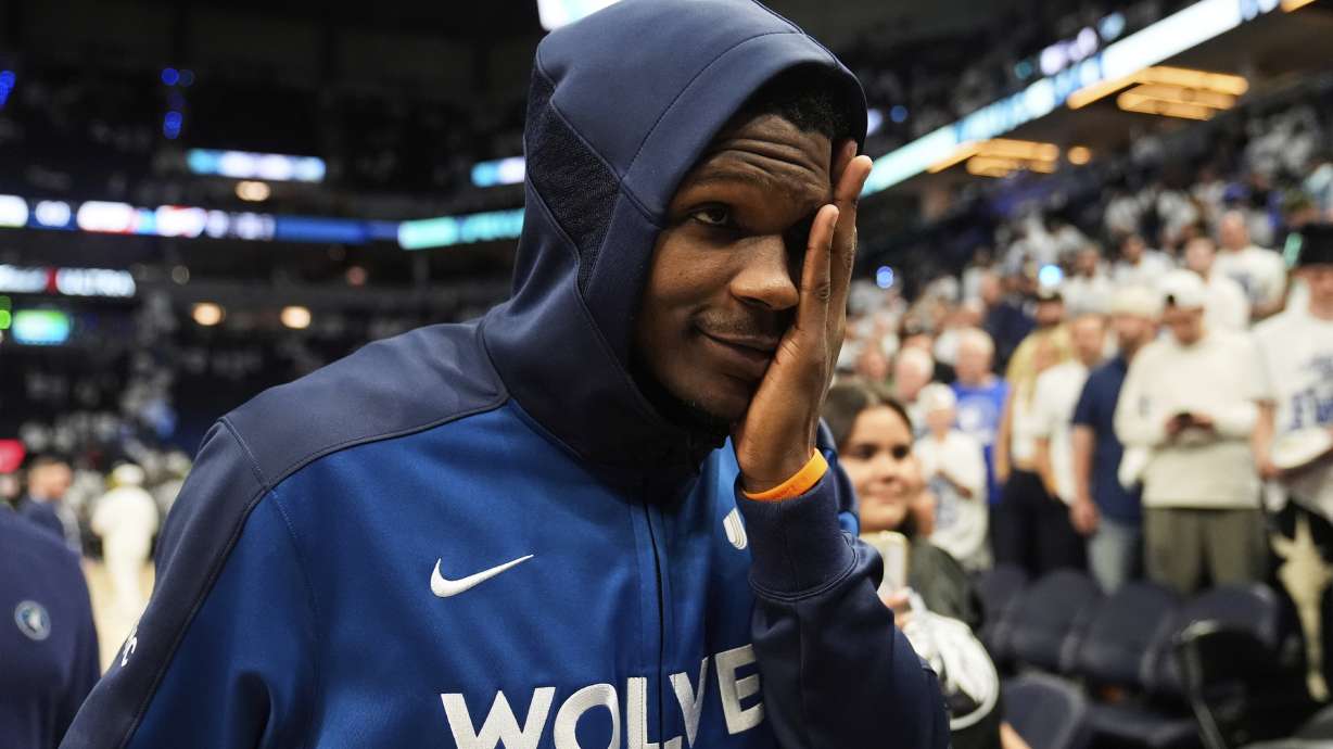 Minnesota Timberwolves guard Anthony Edwards leaves the court after winning Game 3 of the Western Conference finals of the NBA basketball playoffs against the Oklahoma City Thunder, Saturday, May 24, 2025, in Minneapolis.