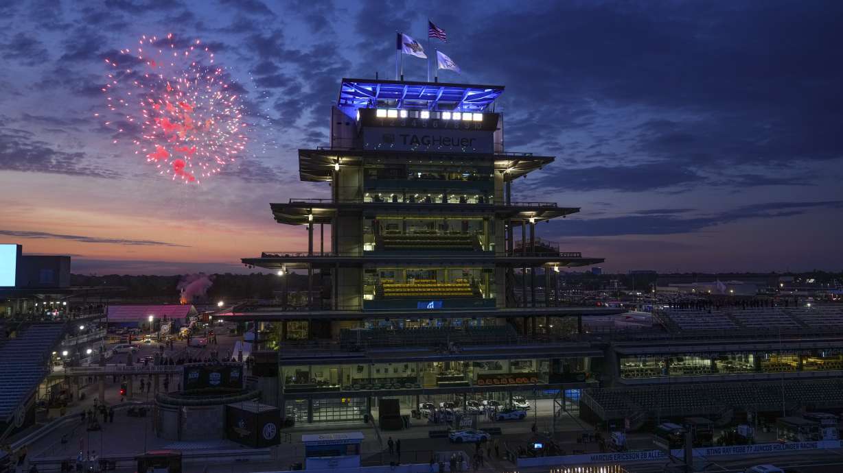 Fireworks are set off behind the Pagoda as the public gates open ahead of the Indianapolis 500 IndyCar auto race at the Indianapolis Motor Speedway in Indianapolis, Sunday, May 25, 2025.