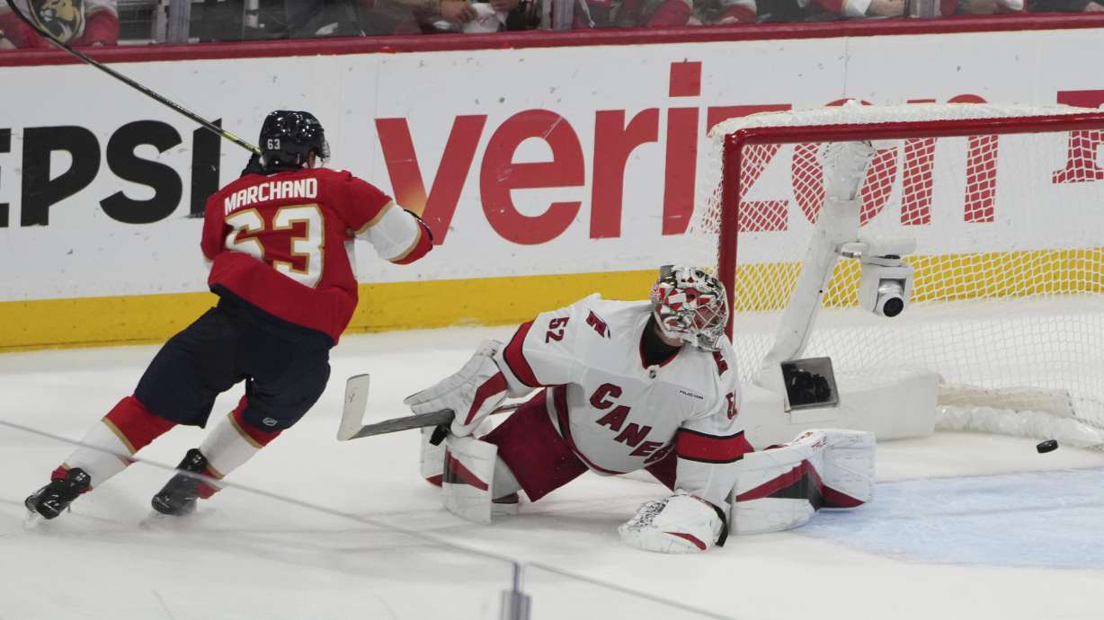 Florida Panthers' Brad Marchand (63) reacts after scoring a goal against Carolina Hurricanes goaltender Pyotr Kochetkov (52) during the third period in Game 3 of the NHL hockey Stanley Cup Eastern Conference finals Saturday, May 24, 2025, in Sunrise, Fla.