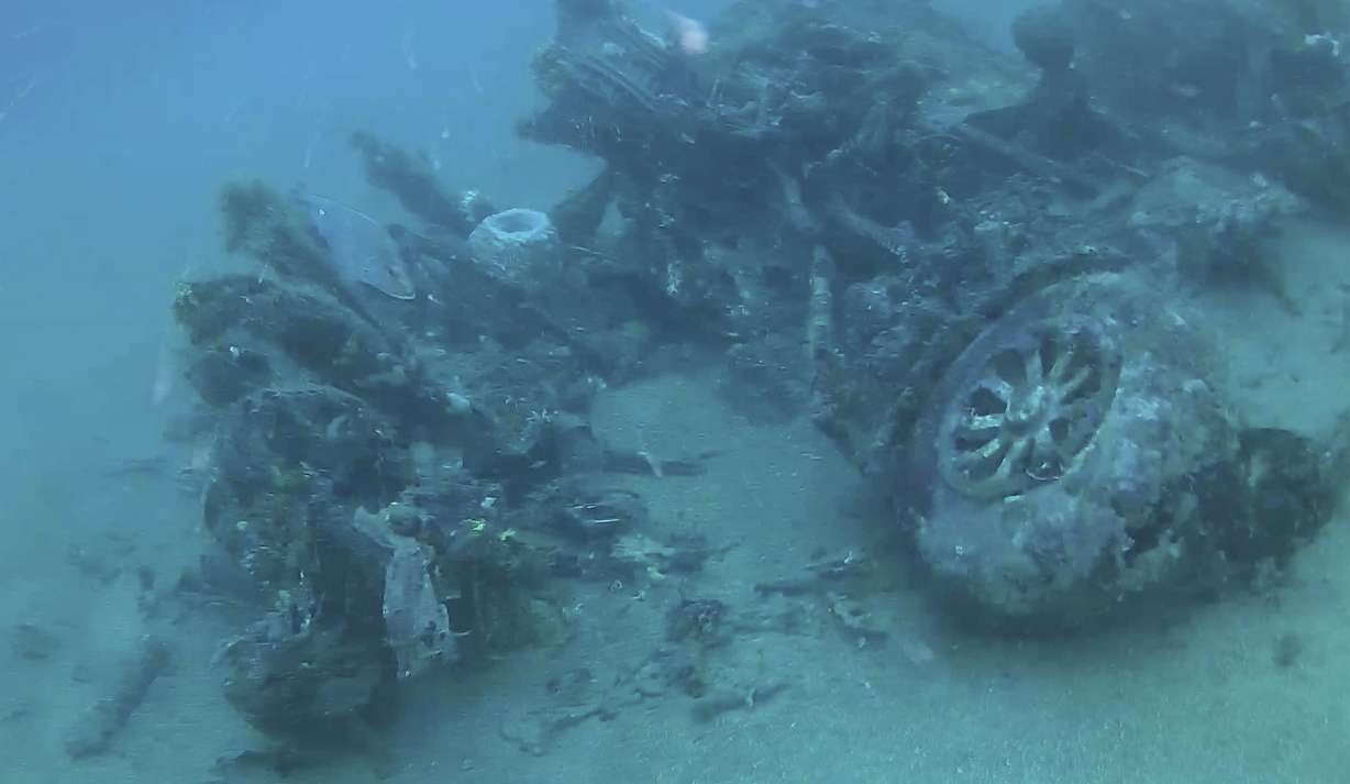 This October 2017 photo shows wreckage of the B-24 Liberator bomber, Heaven Can Wait, lying on the seafloor where it went down during World War II in Hansa Bay, Papua, New Guinea.