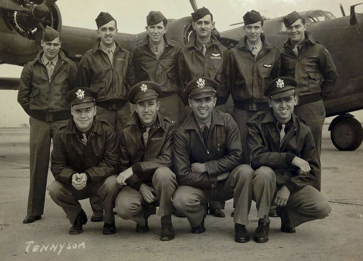 This 1943 photo shows 10 of the 11 members of the crew of the World War II B-24 bomber, Heaven Can Wait, that went down in the waters of Hansa Bay, Papua New Guinea in 1944, including Staff Sgt. Eugene Darrigan, top row second from right, and, bottom row from left, 2nd Lt. Donald Sheppick, 1st Lt. Herbert Tennyson, and 2nd Lt. Tomas Kelly, far right.