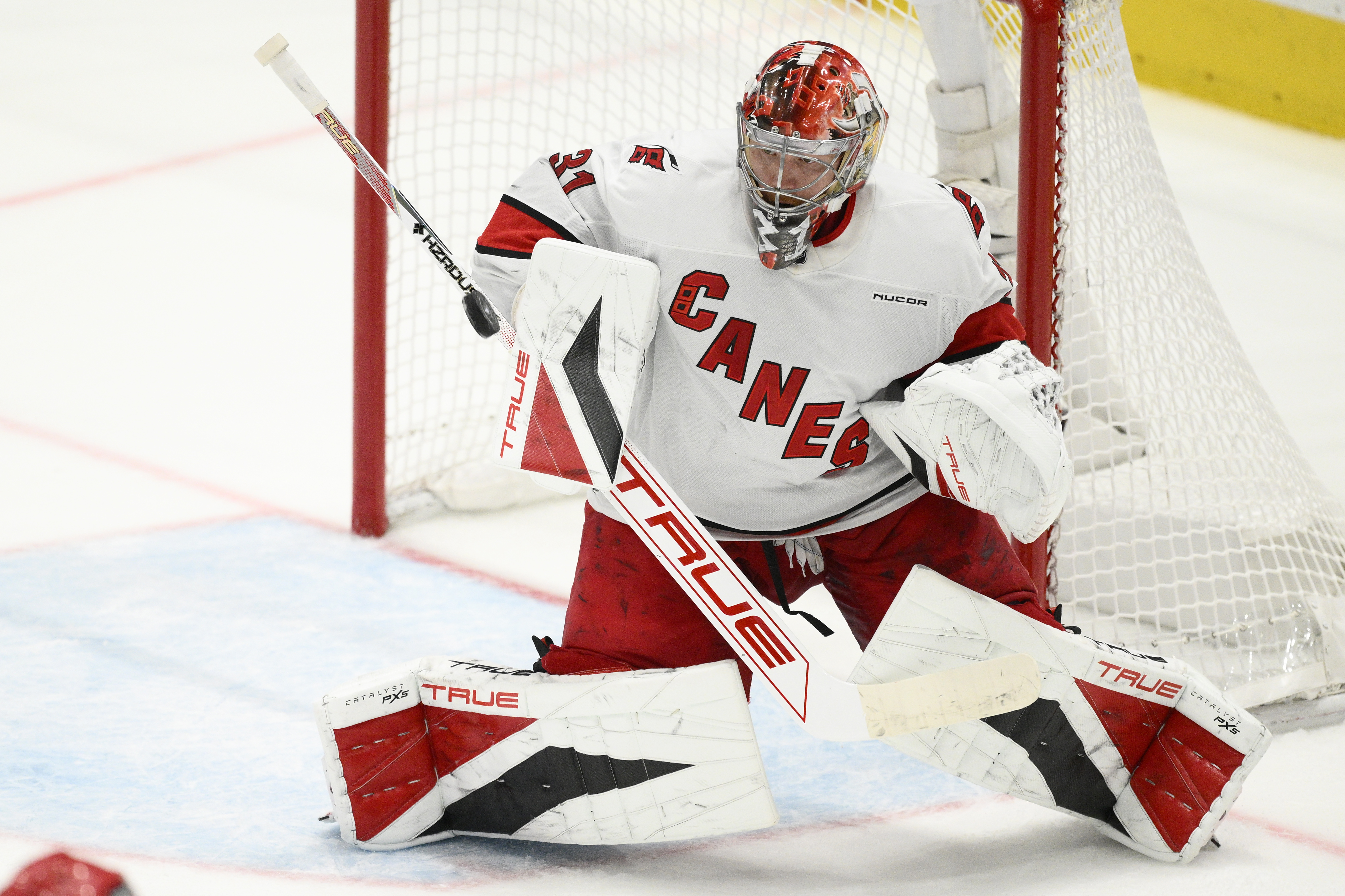 Carolina Hurricanes goaltender Frederik Andersen (31) stops the puck in the third period of Game 5 of a second-round NHL hockey playoff series against the Washington Capitals Thursday, May 15, 2025, in Washington. 