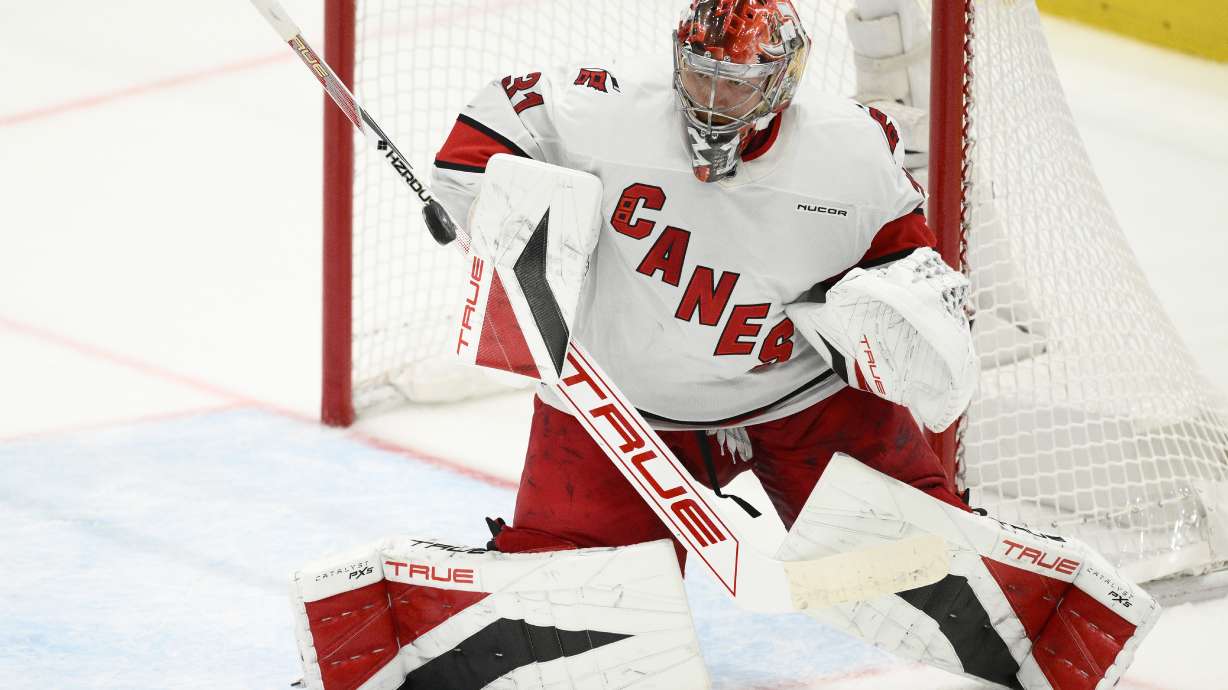 Carolina Hurricanes goaltender Frederik Andersen (31) stops the puck in the third period of Game 5 of a second-round NHL hockey playoff series against the Washington Capitals Thursday, May 15, 2025, in Washington.